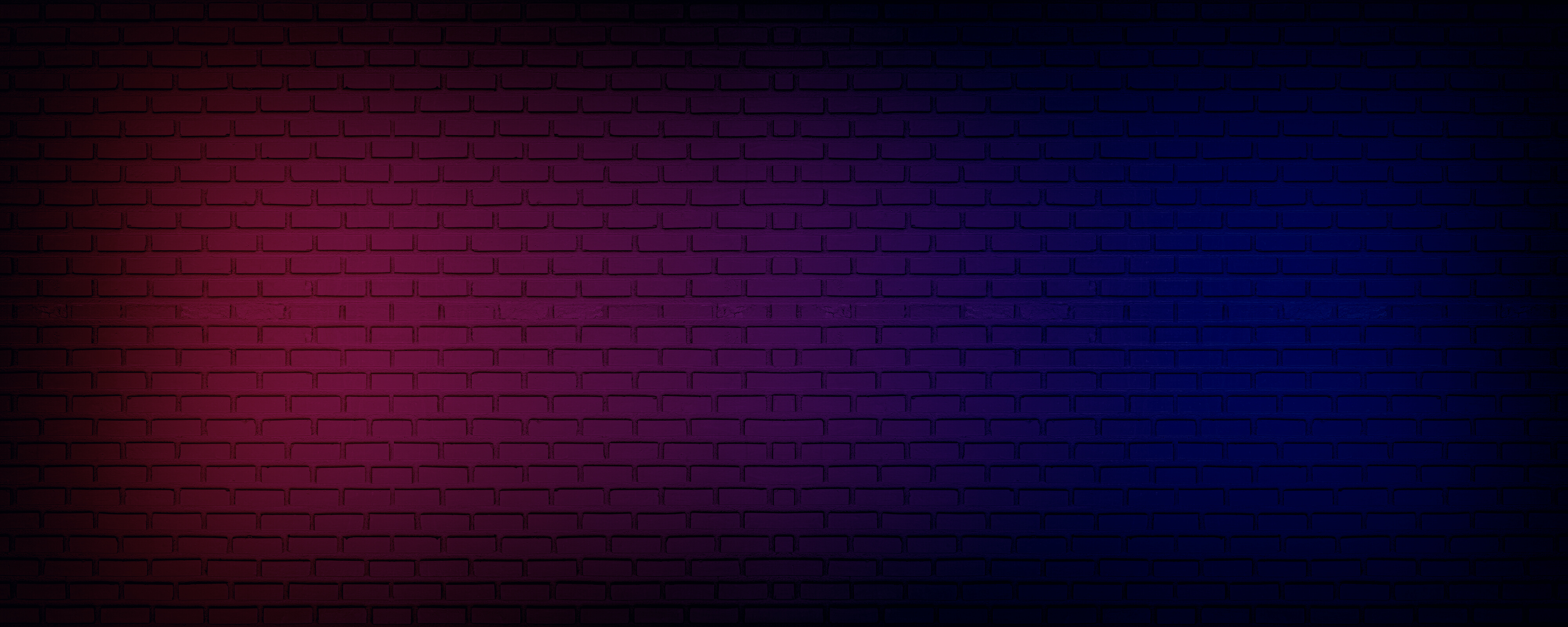Neon light on brick wall texture as background